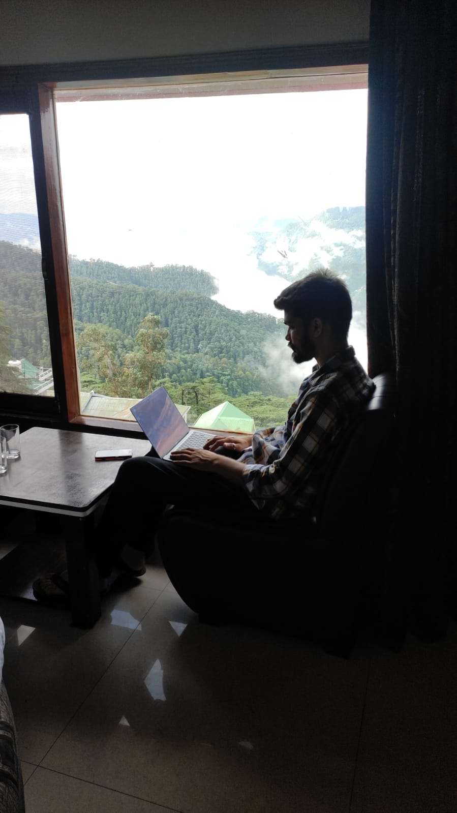 Yogesh Kardwal working on a laptop